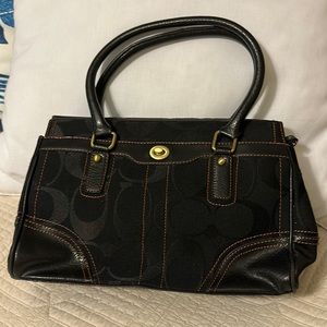 Coach lightly used black handbag   Nice and well taken care of